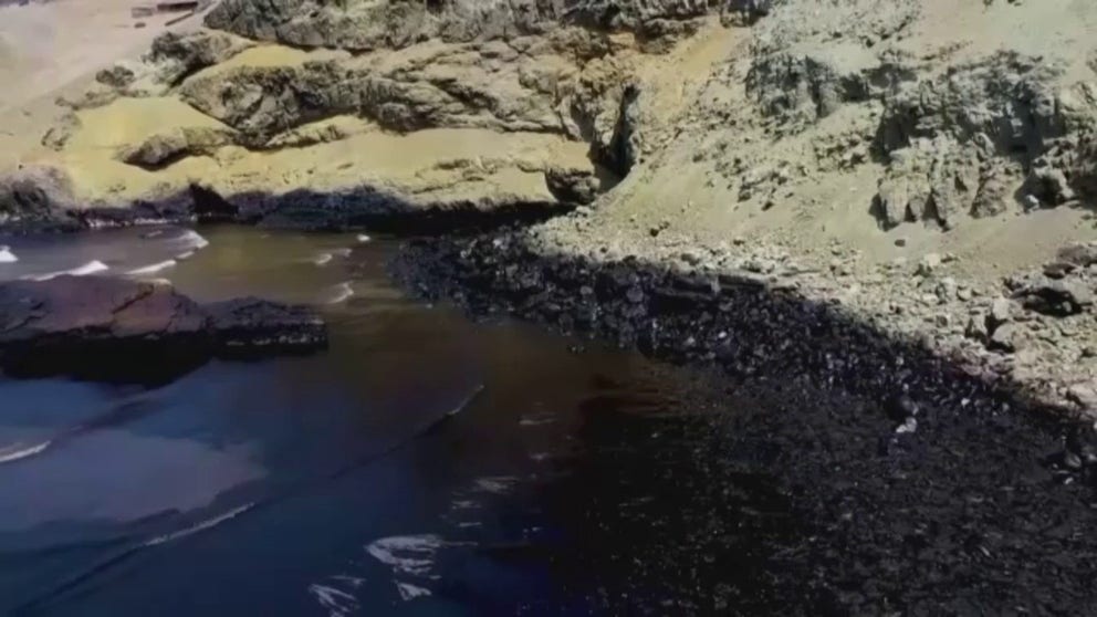 Beaches on Peru’s central coast were coated with black sludge from a ship rocked by waves believed to be caused by the Tonga volcano eruption.