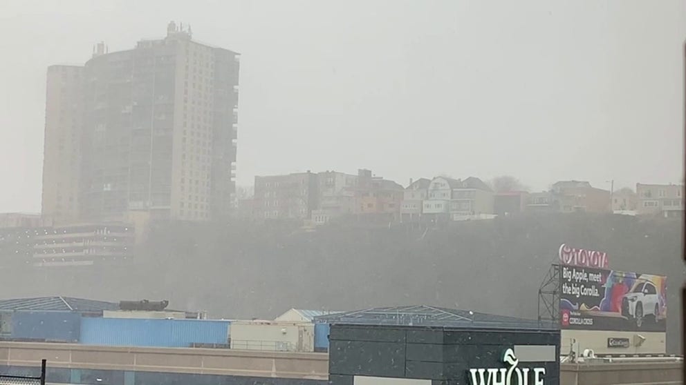 Video shows rain changing over to some snow in the Weehawken, New Jersey, area on Thursday morning.