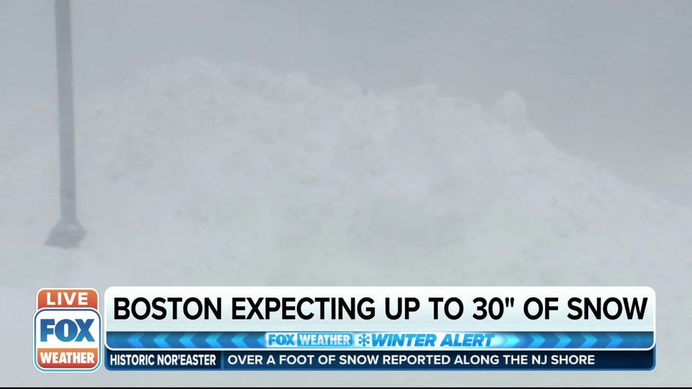 Mountain of snow hides FOX Weather multimedia journalist Hunter Davis during blizzard in Boston. 