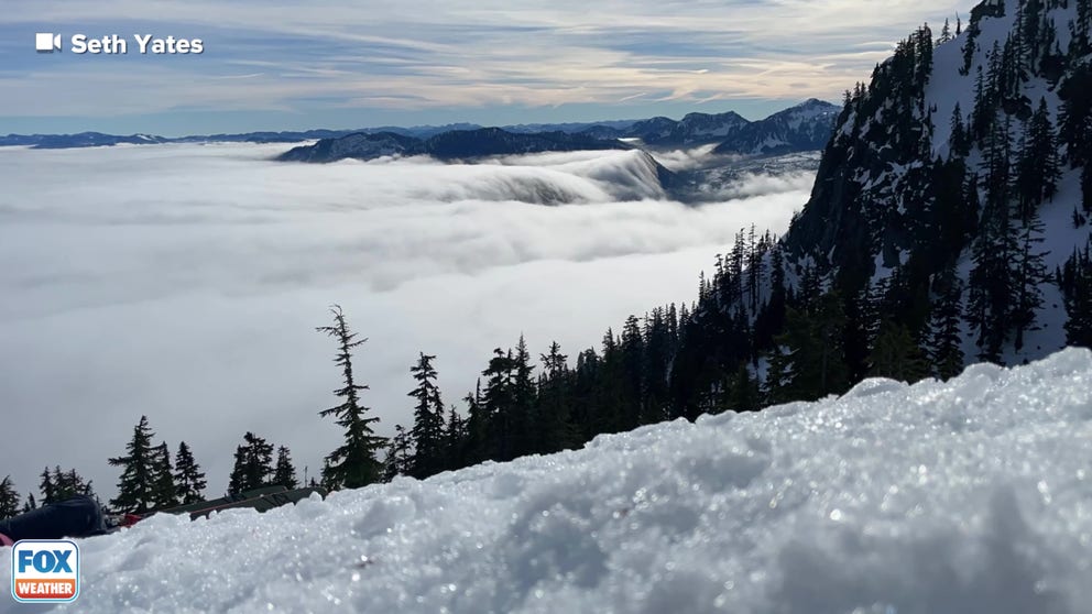 A skier up at Washington's Alpental Ski area spotted this beautiful fog layer blown over the lower mountain tops, mimicking a waterfall. (Video courtesy: Seth Yates)