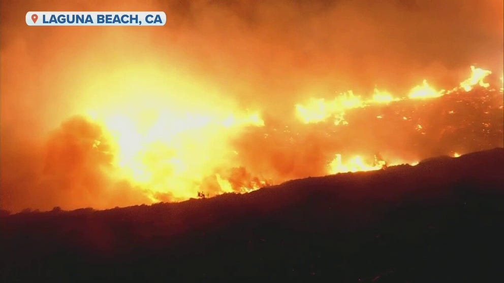 Evacuations are underway in parts of Southern California after a large fire began to quickly spread near Laguna Beach early Thursday morning.