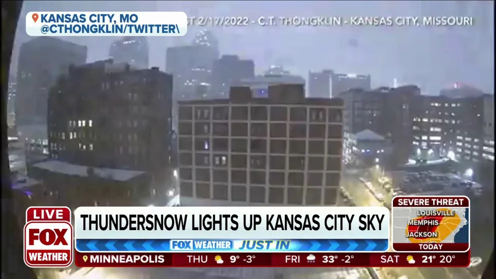 Thundersnow lights up the Kansas City sky Thursday morning. 