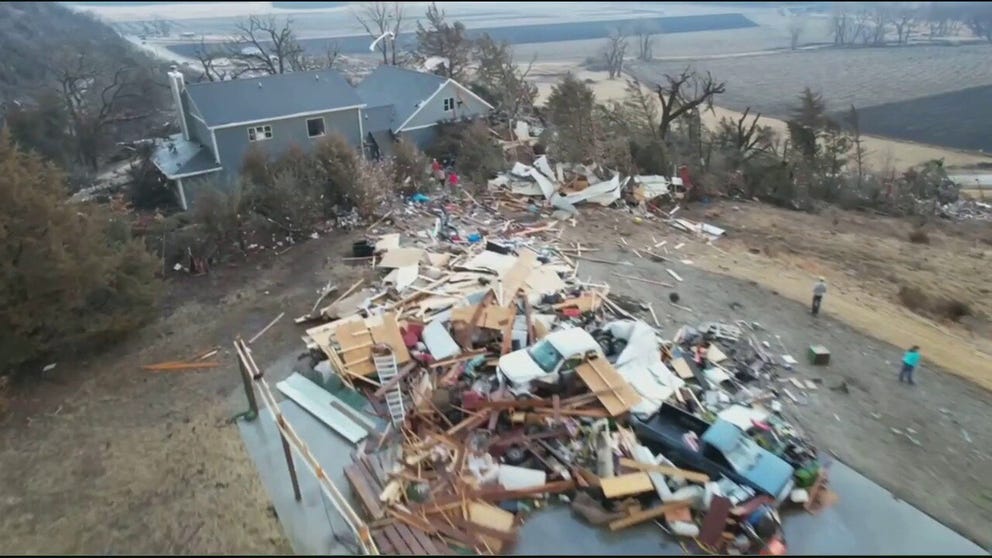 Drone video shows the destruction left behind when a tornado tore through the community of Winterset, Iowa, on Saturday.