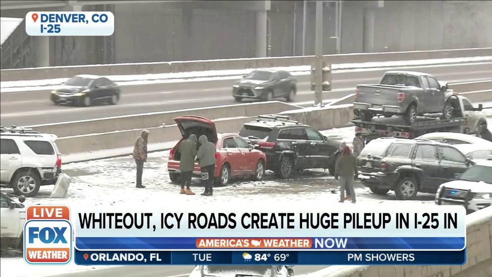 Whiteout conditions and icy roads result in a multi-vehicle crash on Interstate 25 in Denver, Colorado. 