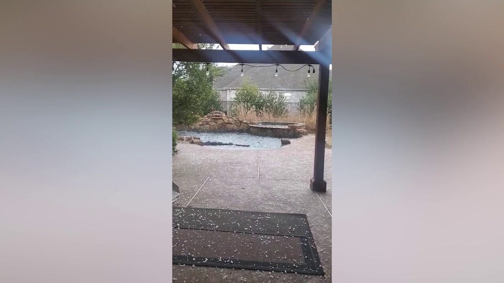 A fast-moving hailstorm is captured hitting Lucas, Texas on Monday. 