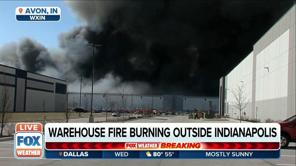 A fire burning at Walmart distribution center near Indianapolis is sending out a smoke plume so large, it can be seen from space.
