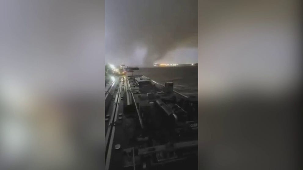 Watch as a tornado passes ships on the Mississippi River in New Orleans Tuesday night. 
