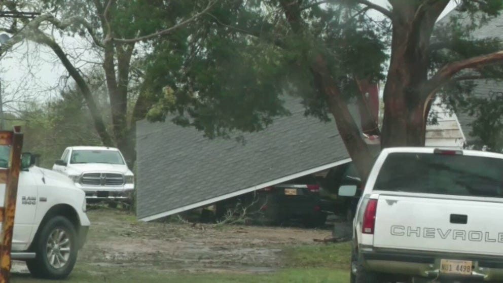 Storm damage around Newton where trees were knocked down along US80 near the MDOT office along Morgan Field Road. Structural damage was also noted as a carport became detached and smashed a vehicle at a home. Numerous large oak trees were uprooted and snapped as well.