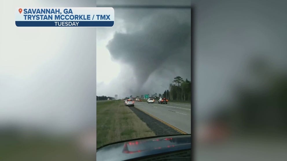 Watch as a man captures this large tornado crossing a highway in Savannah, GA on Tuesday, April 5 as severe storms moved through. 