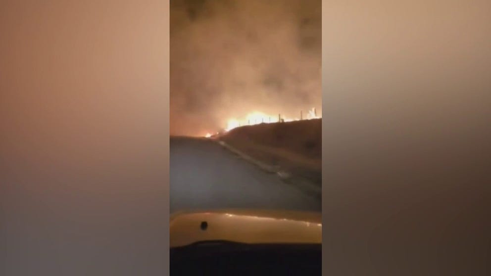 Video captures a wildfire burning an area north of Arapahoe in South Central Nebraska on Thursday evening. Several homes and businesses have been destroyed and the fire has forced evacuations. (Video: Greg Tetley via Storyful)