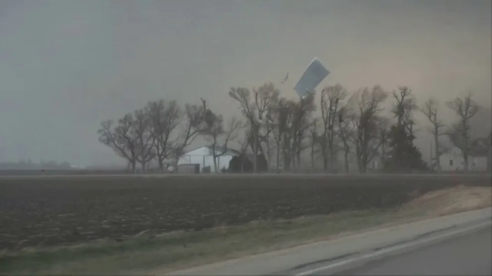 Video captures a tornado moving through Gilmore City, Iowa and taking off a roof from a house. (Video: SevereStudios Hall/Peake)
