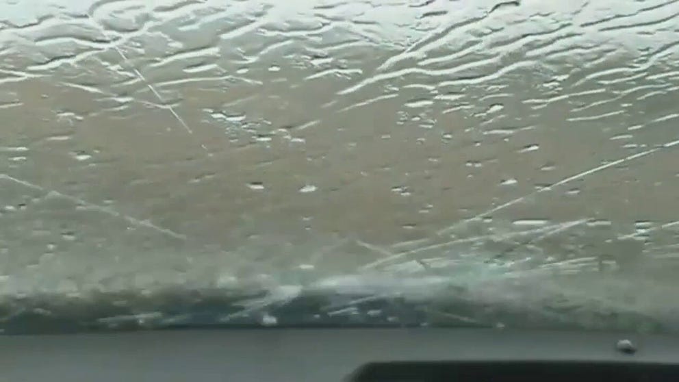 A storm chaser was caught in a large hail storm in Milltown, South Dakota. A stone broke his windshield.