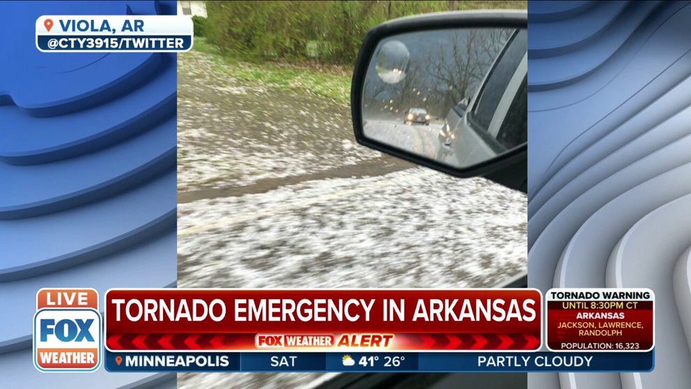 A tornado emergency has been issued in Arkansas. Images show hail coating the ground in the town of Viola.