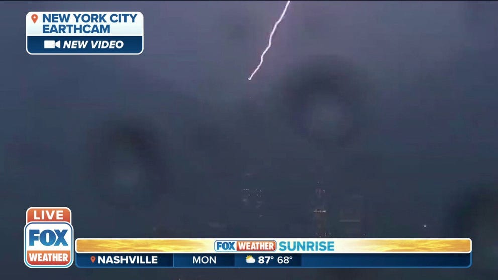Lightning struck atop One World Trade Center in New York, NY during storms Monday morning. 