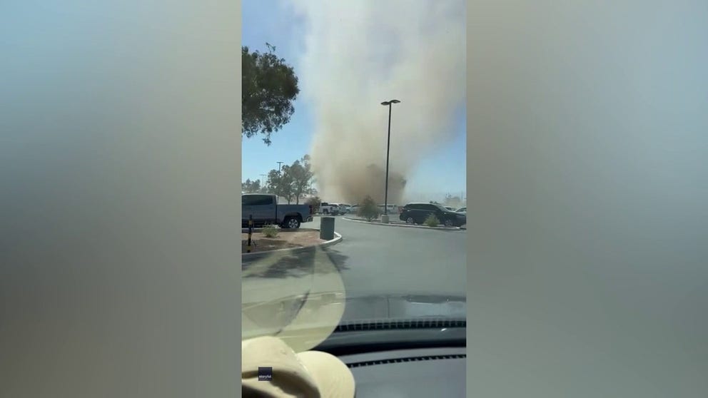Video captures a large dust devil sweeping across a parking lot in in Marana, Arizona. Debris can be seen being pulled from the vortex. (Video: Michael Willever via Storyful)