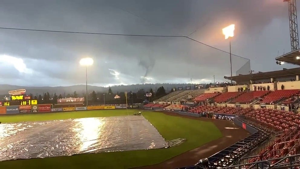 Brian Stern and his sons were attending the Spokane Indians game when they saw a tornado near the field. 