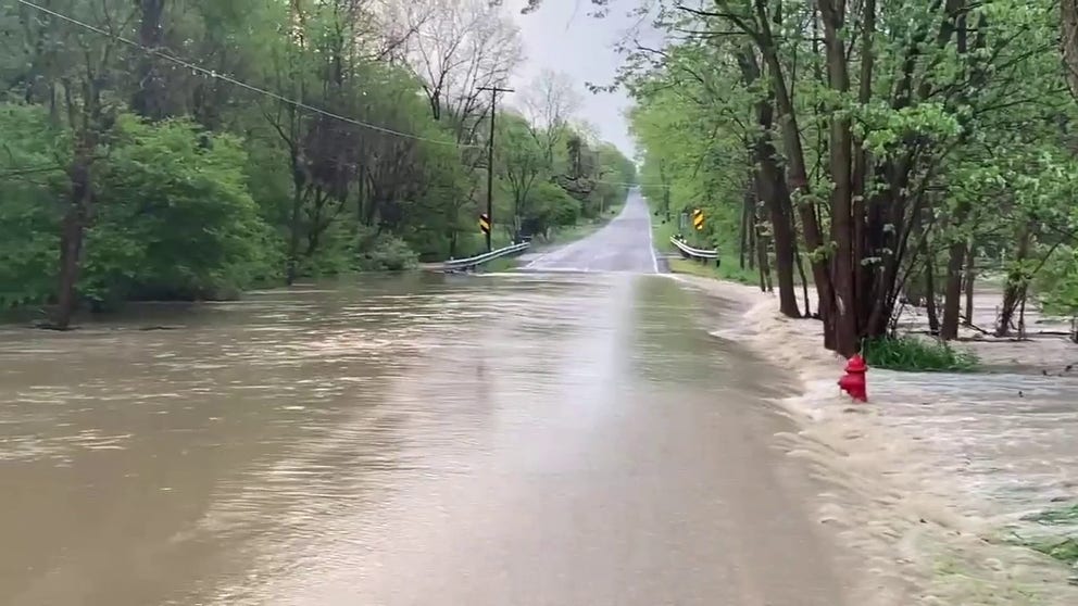 Camel Creek overflowed its bank and swamped Buffham Road in Lodi, Ohio.