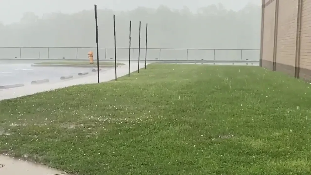 Hail is captured on video hitting the ground of Huntington, Maryland during a storm on May 16. 