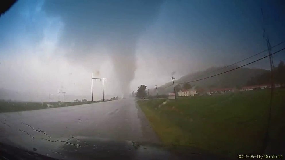 Dashcam video captures a man getting caught inside a Charlestown, New Hampshire tornado on Monday, May 16, 2022.