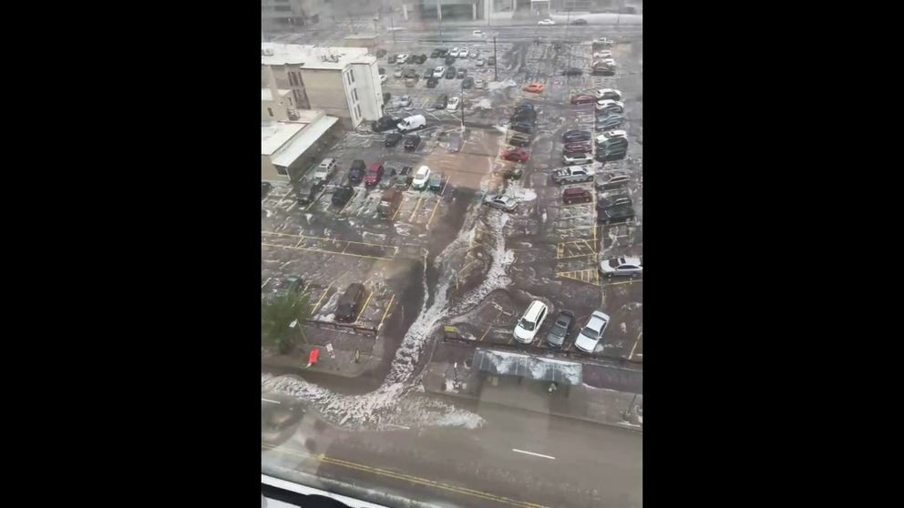 @RealJohnSwartz tweeted the view from his high-rise Thursday afternoon -- rivers of hail.
