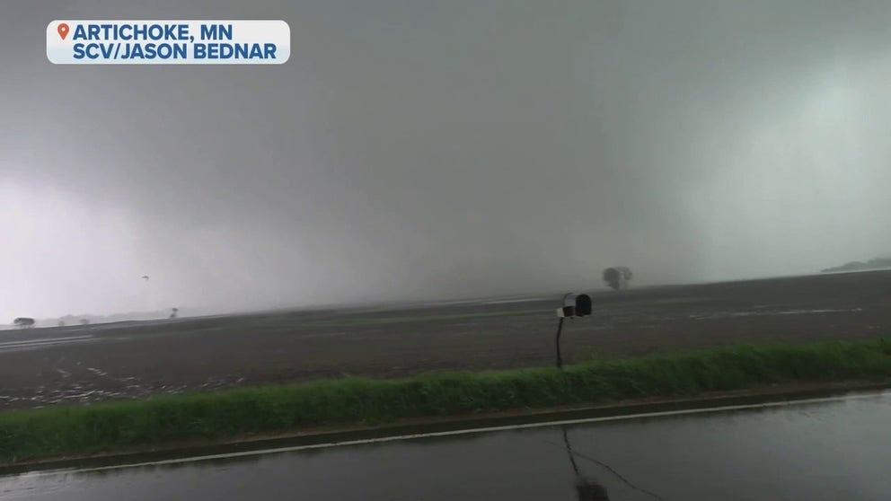 A rain-wrapped tornado was potentially spotted by storm chaser Jason Bednar in Artichoke, Minnesota