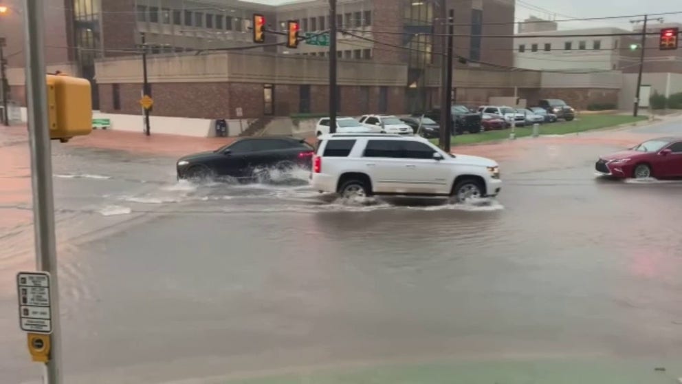Cars plow through flooded roadways in Oklahoma City, Oklahoma on Tuesday. (Video: Wesley Fryer via Storyful)