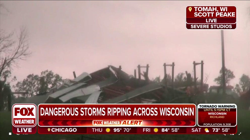 Storm chaser Scott Peake tracked a possible tornado which destroyed this building in Tomah, Wisconsin.