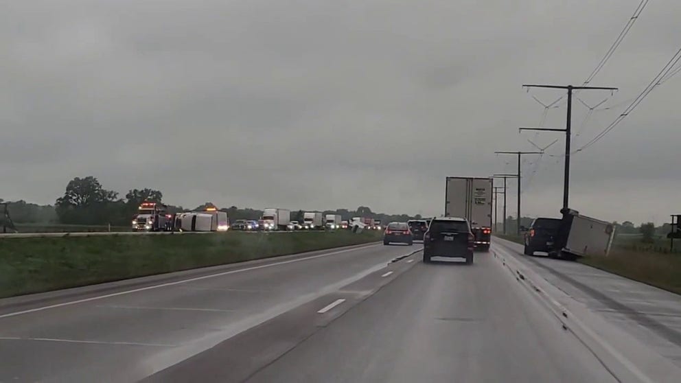 Tornado-warned storm topples trucks on Interstate 90 in Wisconsin. 