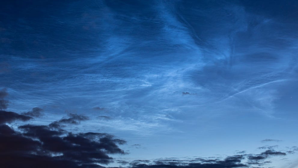 Just before sunrise, a display of cool, blue appeared high above the horizon. But despite the Pacific Northwest's relentless bouts of rain this spring, these clouds were not a sign of wetter hours to come.