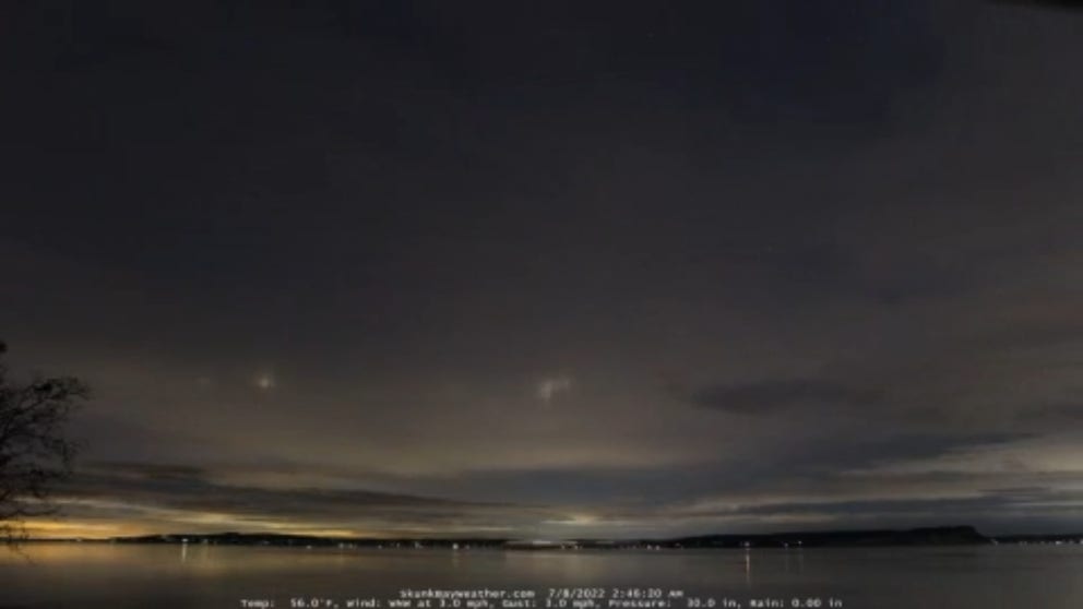 Ice crystals in the clouds over Puget Sound refracted the city lights into vertical beams of light early Friday morning. (Video courtesy: Greg Johnson / SkunkBayWeather.com)