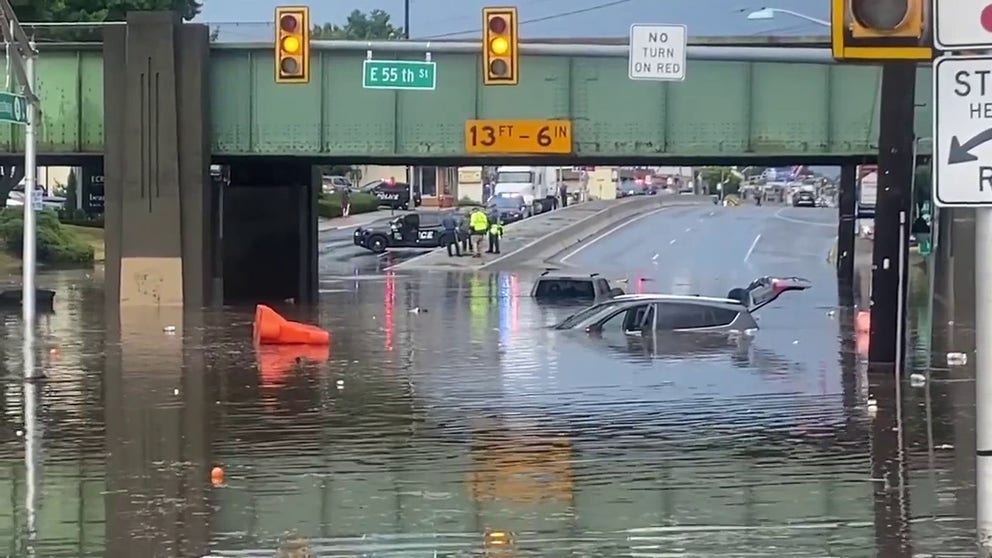 Heavy rains left Broadway in Fair Lawn, New Jersey under feet of water which flooded cars.