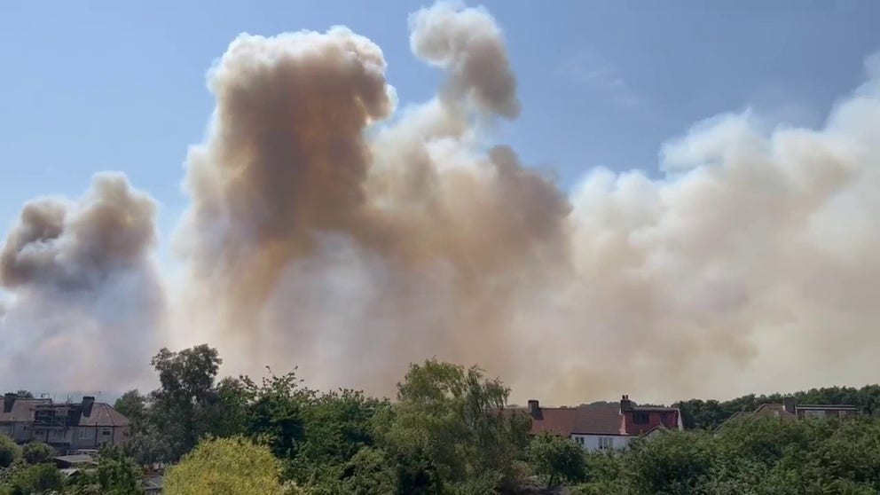 Video captures smoke spreading from a wildfire in Dartford Heath. London briefly held the UK’s all-time record heat on Tuesday with a temperature of 104 degrees Fahrenheit.  