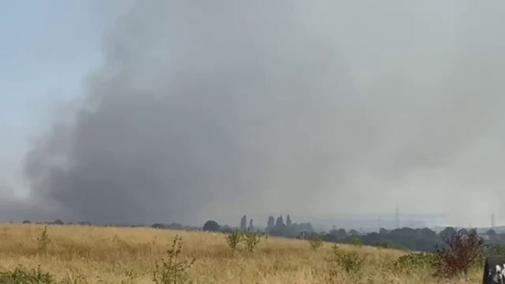 Fires burn in Essex as England bakes in dangerous heat. Britain saw the hottest temperature ever recorded in the country on Tuesday. (Video: @whuharris via Storyful)