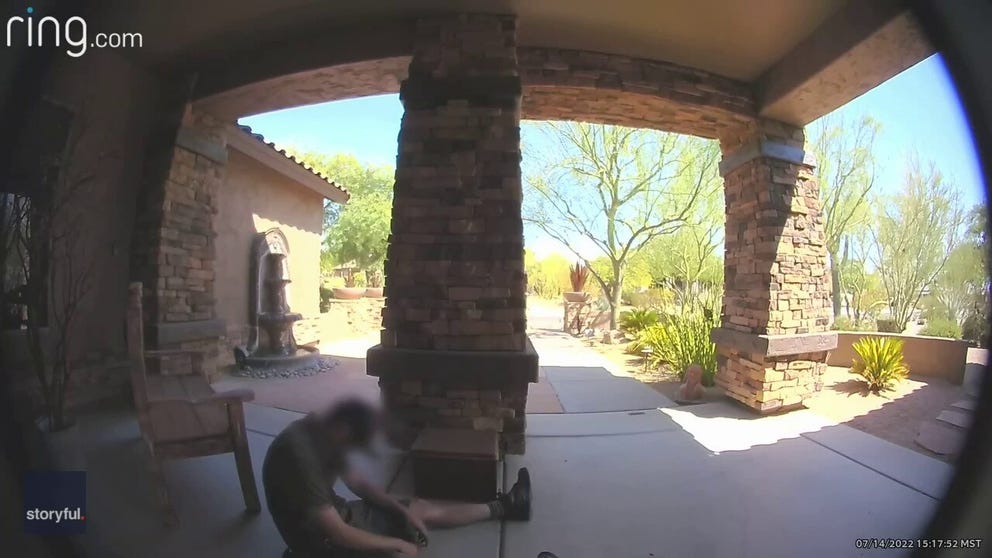 A UPS driver collapsed on a porch during warm weather in Arizona on July 14