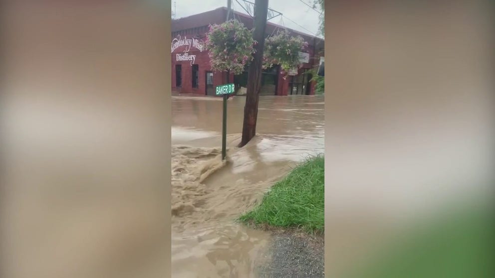 Flooding has turned a street into a raging river in Whitesburg, Kentucky. 