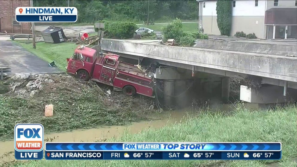 Watch Firetruck seen swept under bridge in Hindman, KY from record