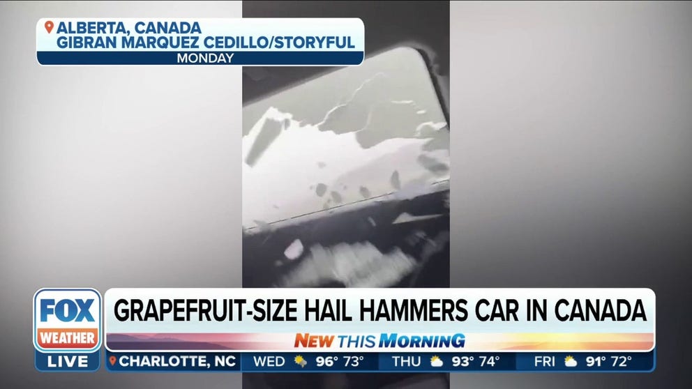 Grapefruit-sized hail smashes car windows while people were trapped inside in Alberta, Canada. 