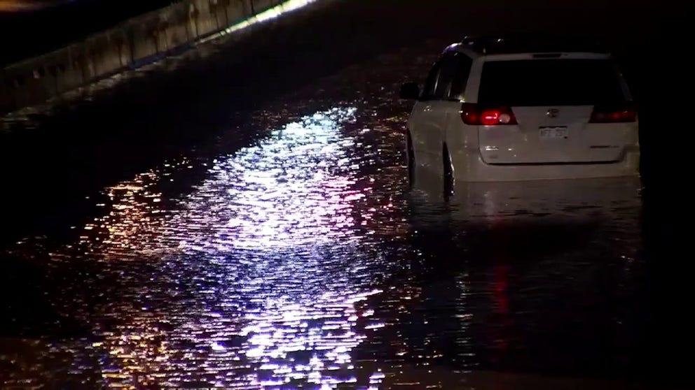 I-70 was flooded in Denver during monsoonal storms on Sunday, causing traffic delays. 