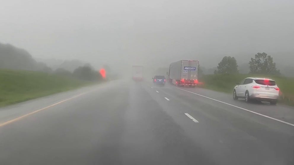 FOX Weather’s Will Nunley films a pocket of heavy rain falling along I-40 between Dickson and Franklin, Tennessee. Two vehicles were reported to have crashed.  