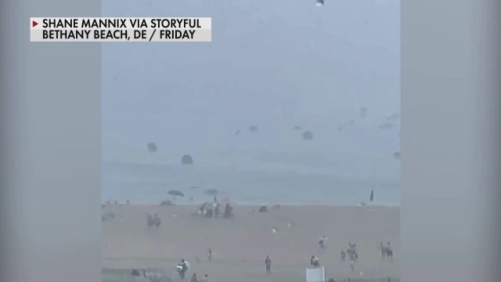 A beachgoer in Delaware caught video of umbrellas flying uncontrollably in Delaware on Friday. 