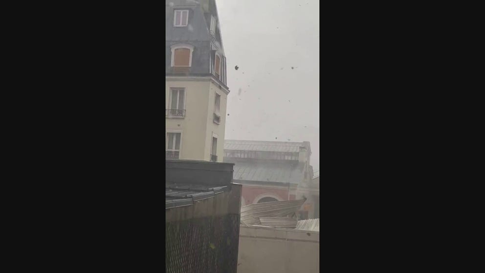 No can opener required to tear this metal roof off a building in Paris. Winds from a severe storm did the trick.
