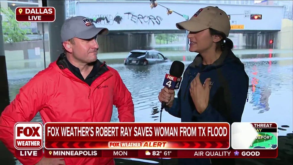 FOX 4 Dallas reporter Shannon Murray pulled up to get video of the flooding in downtown Dallas and moments later, FOX Weather's Robert Ray had to rescue a woman from her vehicle. There was another vehicle completely submerged just ahead of hers.