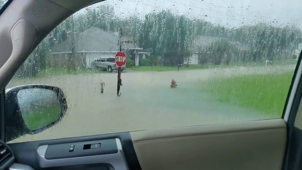 A street in Brandon, Mississippi turns into a river during flash flooding on Wednesday. (Video: @MandyKate24/Twitter)