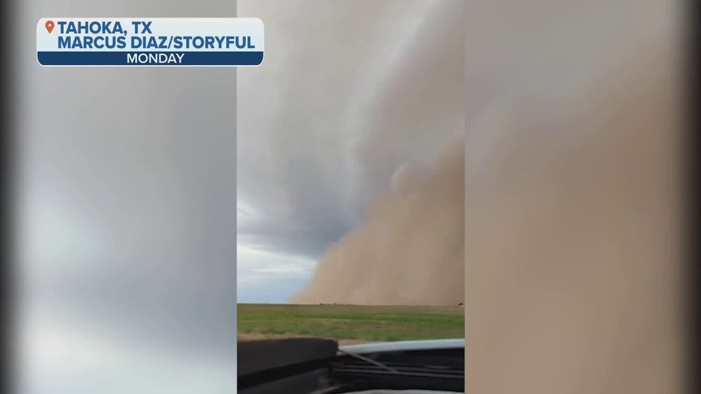 Watch a storm chaser speed away from a Texas haboob.