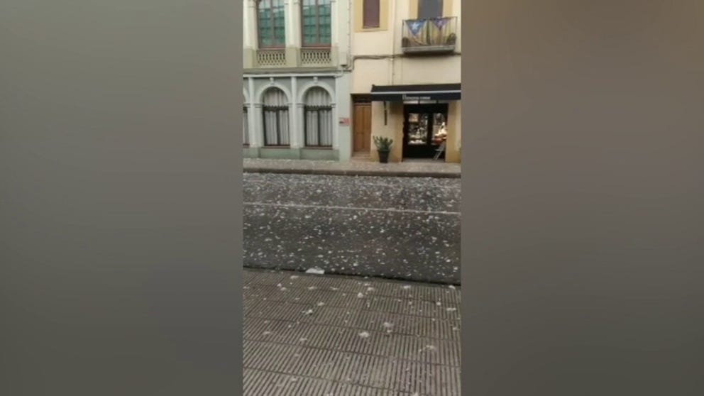 Footage shows hail falling on a street in La Bisbal d'Emporda, Spain on Tuesday. A 20-month-old-girl was killed and dozens were injured. The Meteorological Service of Catalonia said that hailstones of up to 10 cm in diameter fell in the town. (Video: Lluis Riba via Storyful)