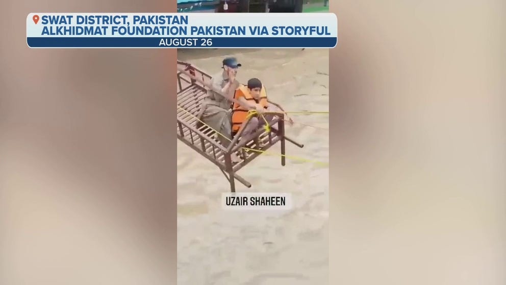 Volunteers in Pakistan rescued a boy and man from a flooded home using a bedframe and rope.