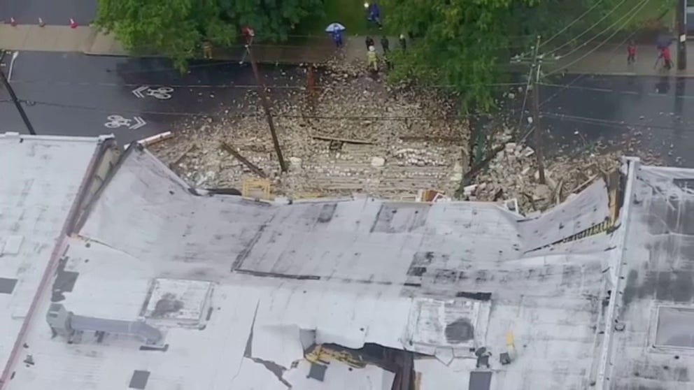 Video shows the aftermath of a roof collapse due to heavy rain and flash flooding in Providence, Rhode Island on Monday. 