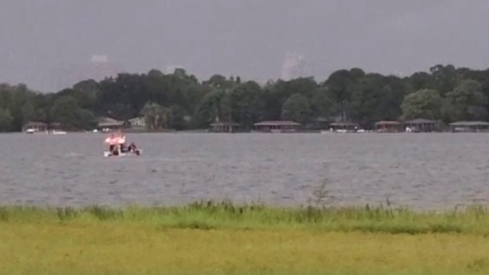 One person has been transported to the hospital and a dive team is working on locating a missing boater after reports of a lightning strike north of Orlando.
