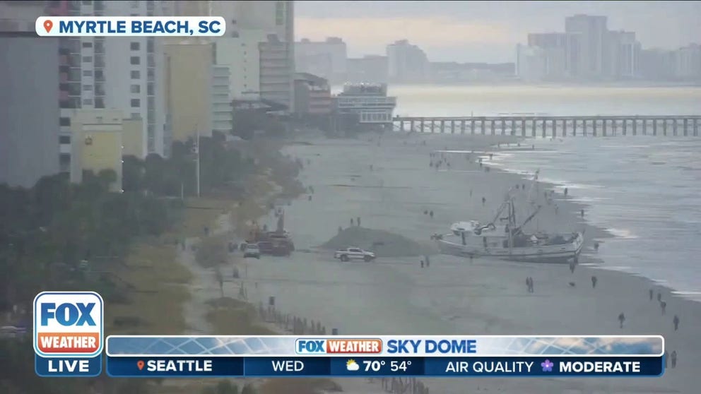 Hurricane Ian washed a shrimp boat ashore on Myrtle Beach. Crews spent several days, around the clock to get the boat sailing again. Time-lapse video shows the night and day activity.