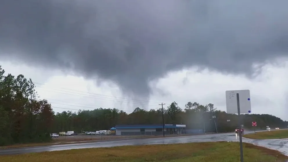 A video shows a tornado crossing Interstate 10 near Moss Point, Mississippi, on Saturday when severe weather moved through the region.